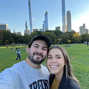 A selfie shot of Jacob and girlfriend Laura in front of a field in Central Park