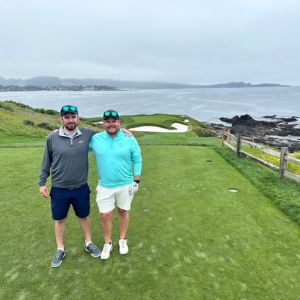 David and friend at golf course on beach