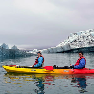 Amanda and David kayaking around glaciers