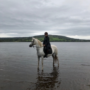 On horse: Riding across a Lough in Ireland