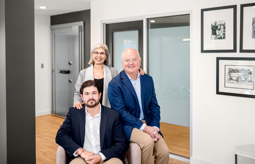 Jacob and Dalal Salomon and Dan Ludwin in their Richmond, Virginia financial advising office