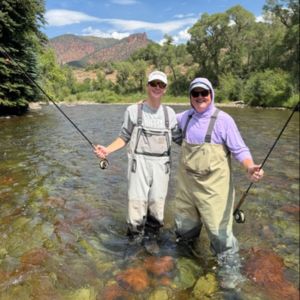 Jack and his dad fly fishing