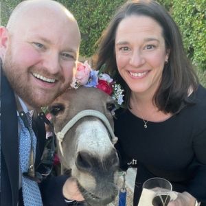 Sara and her husband with the "beverage burro"