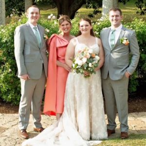 Beth with her kids at her daughter's wedding